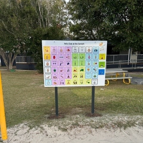 ACM school signage installed in a playground